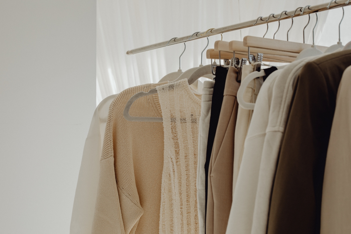 A curated rack of chic, timeless clothing inspired by the best style blogs for women over 50.